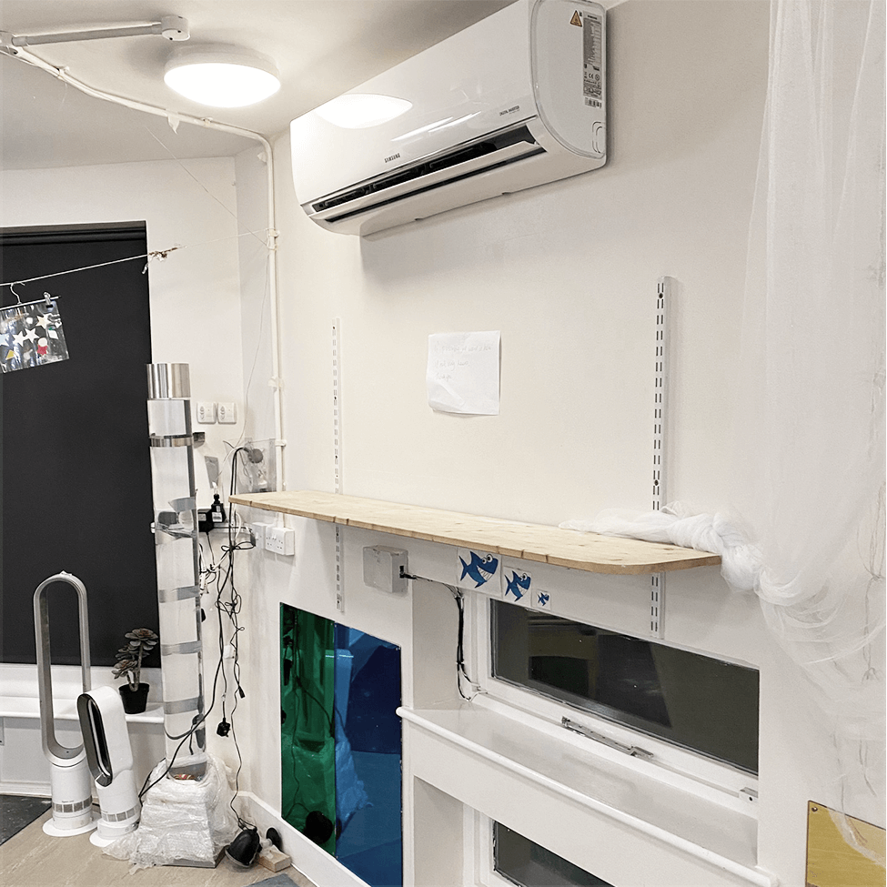 Air conditioning installed above a commercial work area